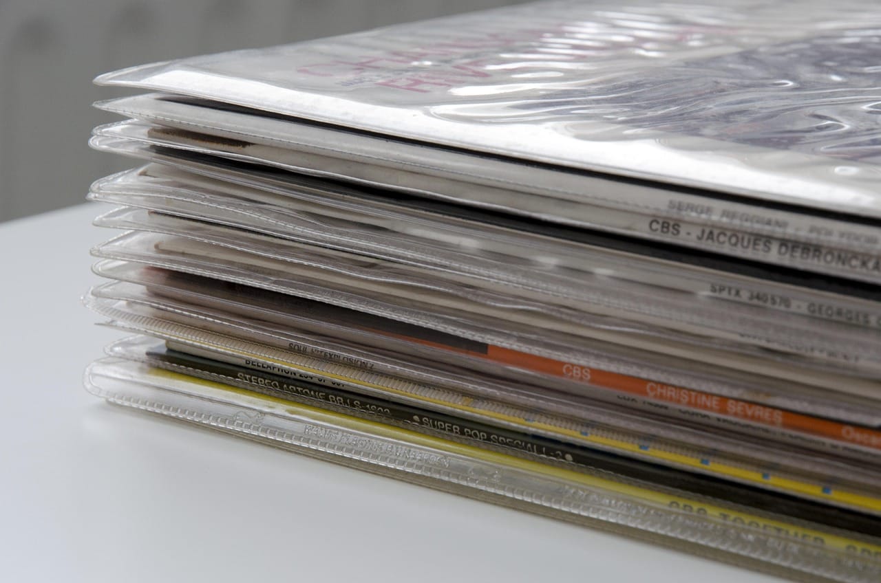 Thirty centimetres of artwork, notes and credits.